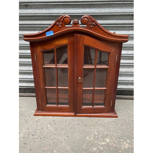 698 - Mahogany wall hanging curio cabinet.