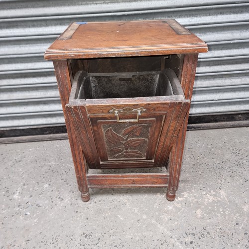 699 - Oak carved coal box.