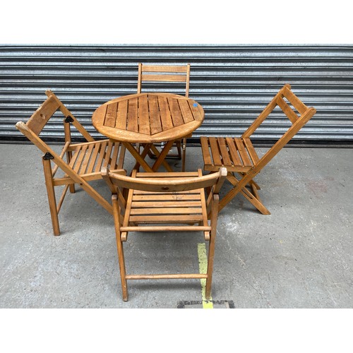 703 - Outside wooden patio set.