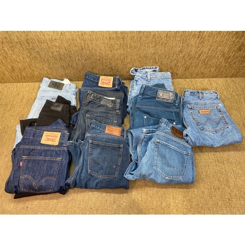 96 - 10 pairs are various sized designer jeans including Levi strouse, Calvin Klein And Tommy hill figure... 