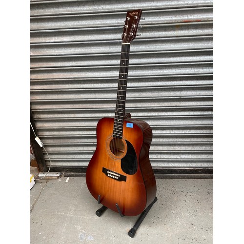 708 - A Hudson acoustic Guitar model number HT-TSB.