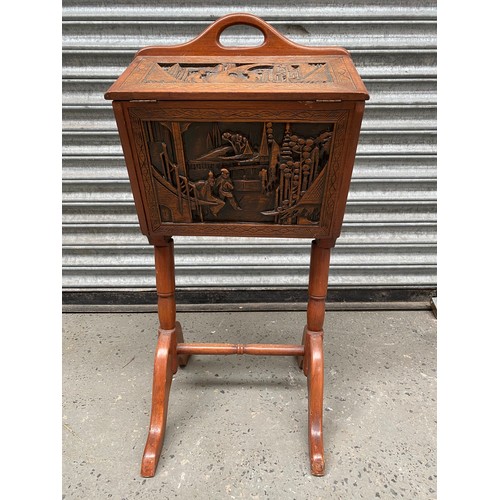 710 - Antique carved Oriental crafts storage / Sewing box on legs.