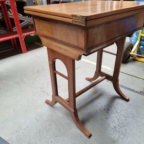 713 - Regency style folding and rotating Games table.