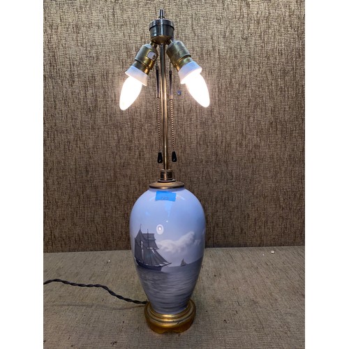 723 - Heavy brass and ceramic nautical themed table lamp