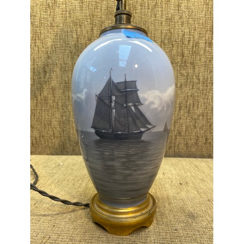 723 - Heavy brass and ceramic nautical themed table lamp