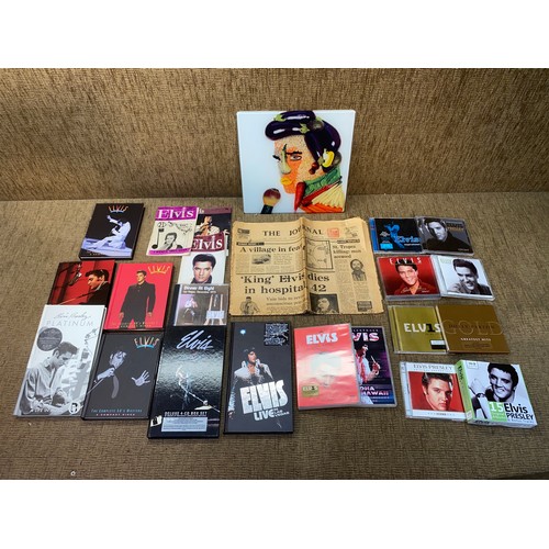 733 - Elvis Presley memorabilia and CDs.