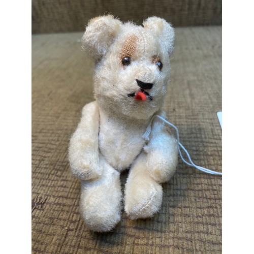 1252 - Antique German teddy bear with moving limbs straw filled 13cm tall.