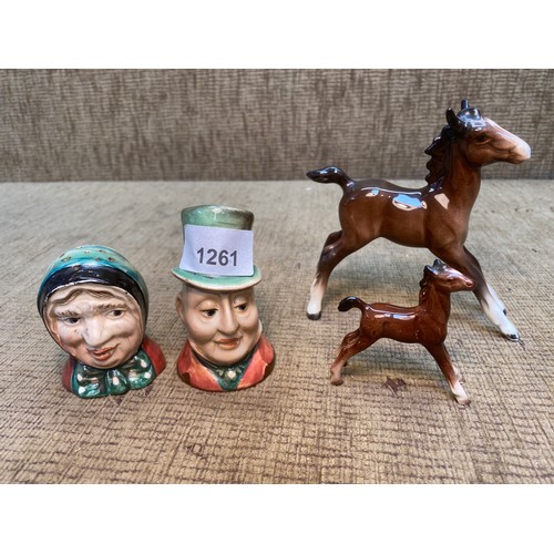 1261 - Beswick salt and pepper shakers, a Beswick horse and one other ceramic horse.