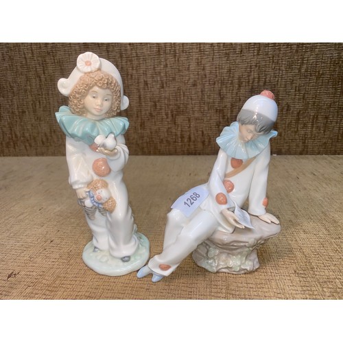 1268 - A pair of Nao figures by Lladro 16cm tall.