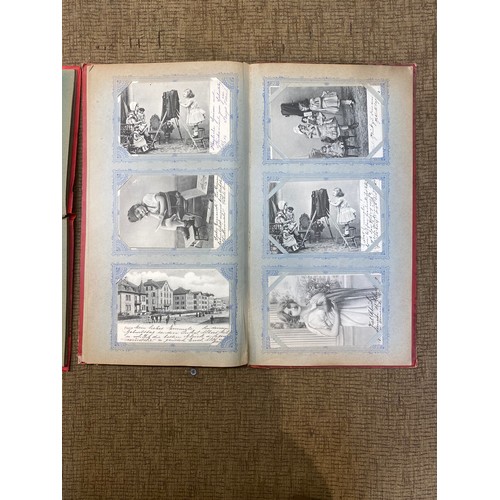 741 - Two antique postcard albums with approx. 140 German and Swiss postcards.