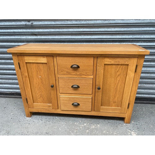 166 - Light oak sideboard 115 x 76 x 34 cm.