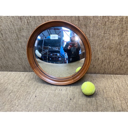 175 - Porthole mirror in a walnut frame.