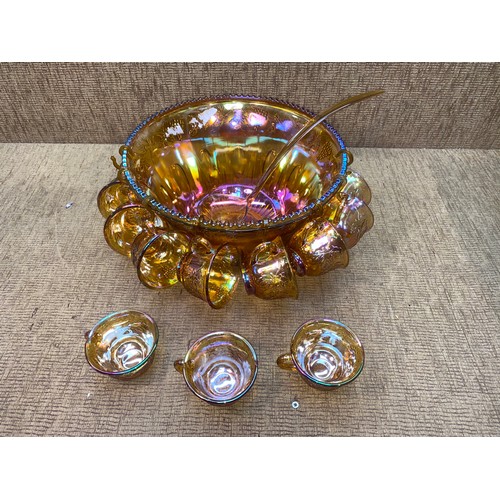 482 - Carnival glass punch bowl set with glasses.