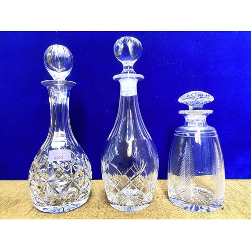 484 - Three quality lead crystal decanters ( including stoppers) .