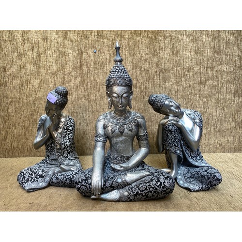 485 - Three double lotus meditation silver and black Buddha figurines.