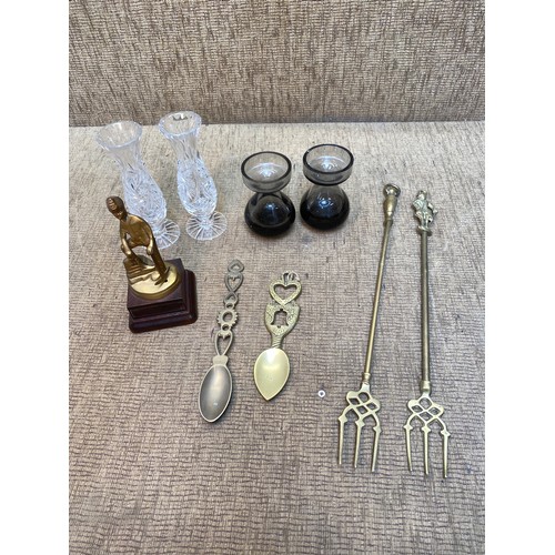 487 - Crystal , glass and brass items including miner on wooden base and Welsh love spoon .