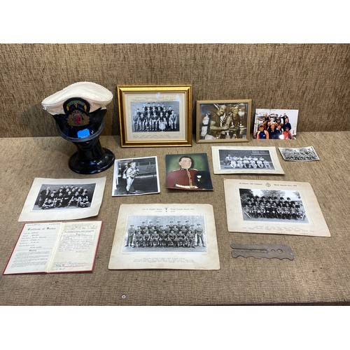 788 - Collection of military photos and items including a service cap.