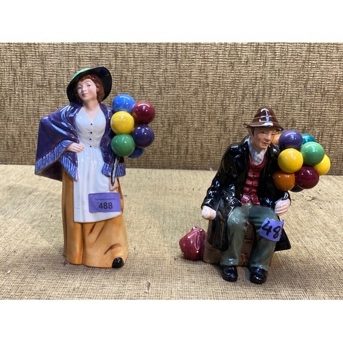 488 - Two Royal Doulton figures . ‘The Balloon man’ Hn 1954 and ‘The Balloon lady ’ Hn 2935.