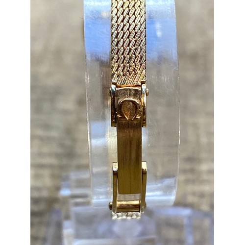 1090 - Omega 18ct gold Ladies watch working. 31.2g.