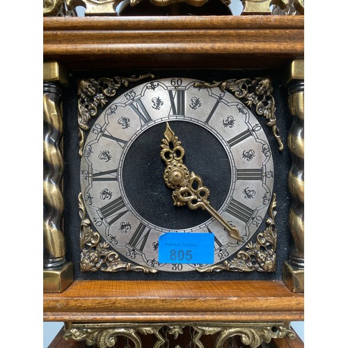 805 - Dutch atlas wall clock Nuelck syn sin (to each his own) with weights and chains.