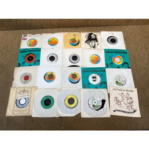 136 - 20 Bob Marley and Roxy music singles (condition various from V good - fair, some may require cleanin... 