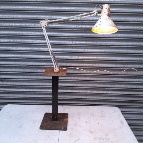 847A - Angle poise lamp on a industrial stand.