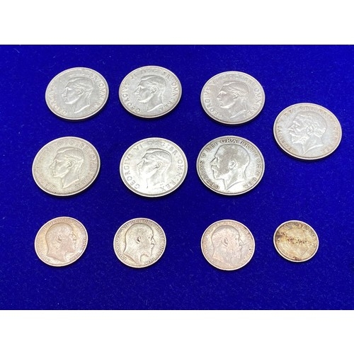 1098 - Seven half silver, half crowns and a six pence (1922-46, and three silver shillings (1902,06,10).