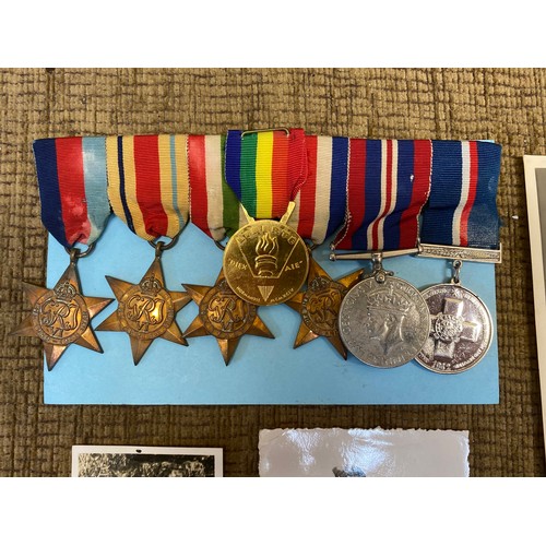 1112 - Group of four WW2 medals 1939-45 Star, Africa Star, Italy Star and France and Germany star, along wi... 