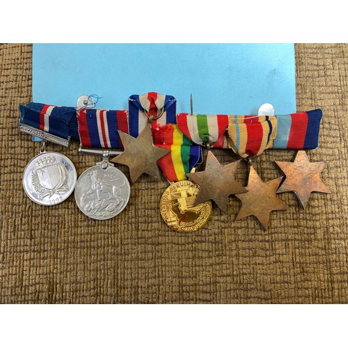 1112 - Group of four WW2 medals 1939-45 Star, Africa Star, Italy Star and France and Germany star, along wi... 