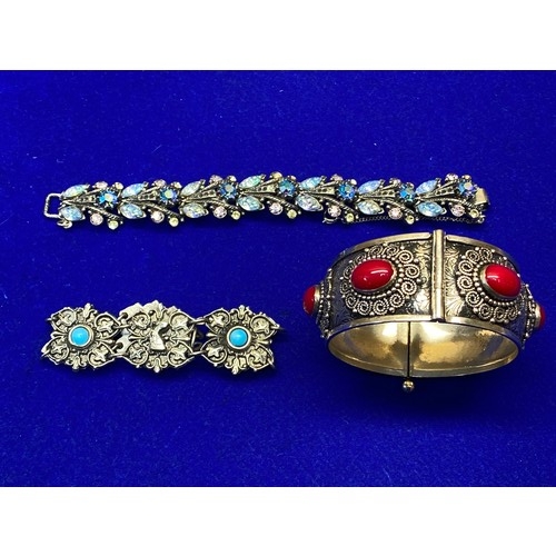 1127 - Three white metal costume bracelets with semi precious stones.