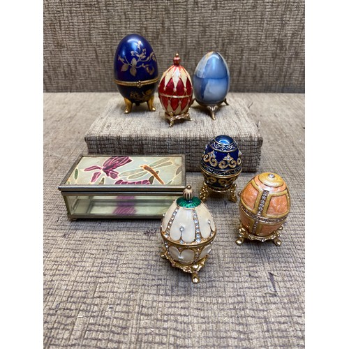 499 - Six Faberge style egg trinket boxes and a dragon fly painted glass trinket box.