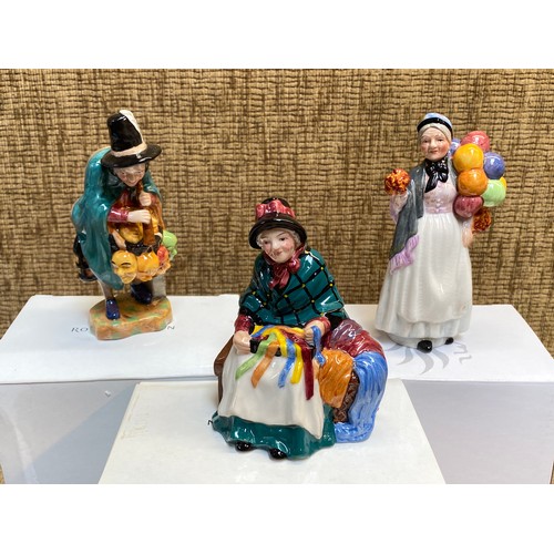 1756 - Three Boxed Royal Doulton figurines including Miniature street vendors and Silks and Ribbons.