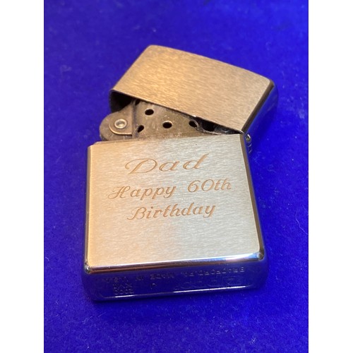 1440 - Elvis Zippo with engraving to rear.