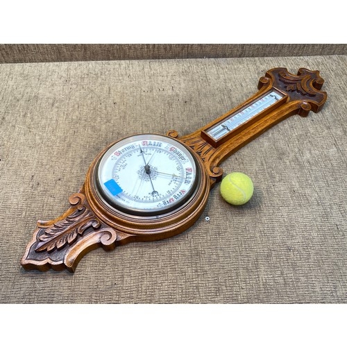 1128 - Solid Oak Aneroid barometer with crack to glass.