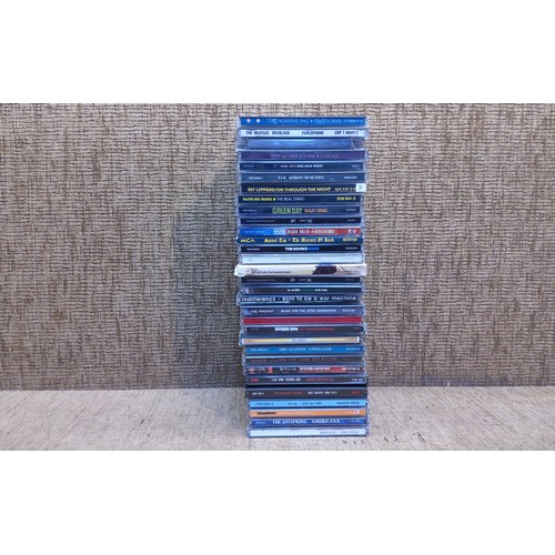 249 - 30 Compact disks including -
Pink Floyd - The Divisional Bell.
Beatles - Revolver 
Morrisey - Years ... 