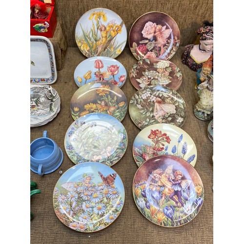 593 - Collection of Ceramic cups and plates including a set of Border Fine Arts Fairy garden wall plates.