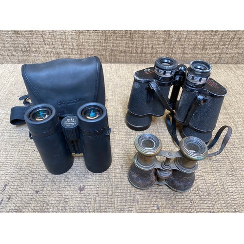 887 - Three pairs of Binoculars including Opticron, Scope and Le Jockey Club Paris.