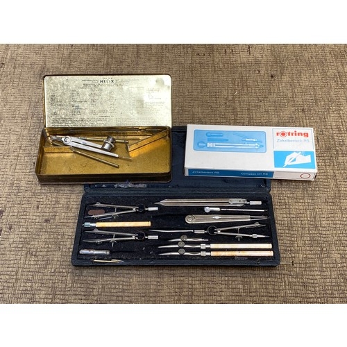 888 - Two vintage compass sets including Rotring and a French 12 piece set.