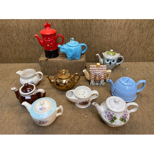 621 - 9 character tea pots.