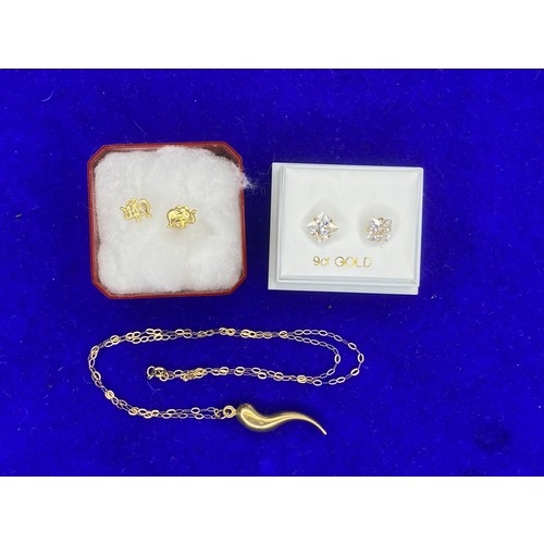 1531 - 9ct gold chain and pendant 0.8 grams and two pairs of 9ct gold earrings.