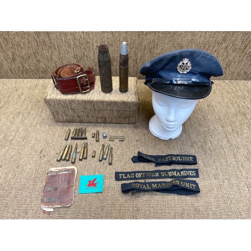 1270 - A collection of military items including cap badges and buttons, RAF Cap, Navy hat ribbons and empty... 