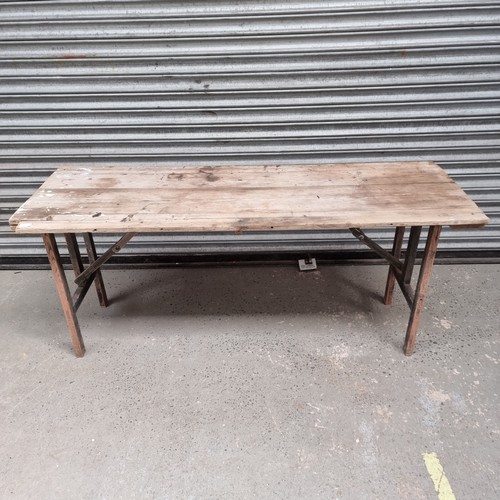 721 - 5ft wooden folding table.