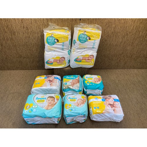 10 - 6 packs of Babies Nappies size 4+.