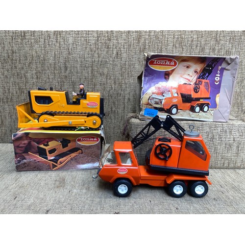 1056 - Two boxed vintage Tonka Toys.