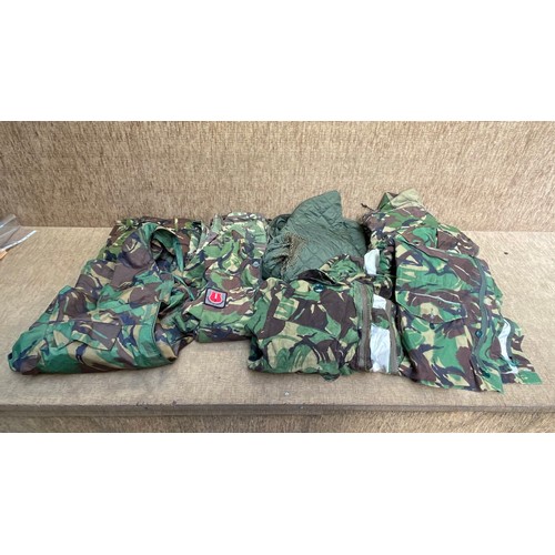 54 - Army camouflage coat's and trousers.