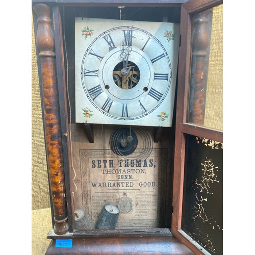 1064 - Antique Seth Thomas wind up wall clock. 64cm.