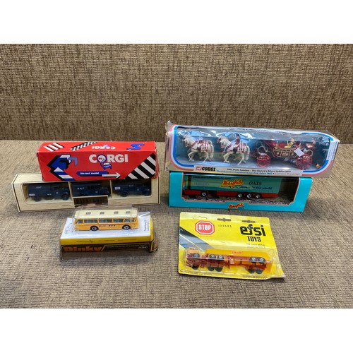 1096 - Boxed diecast trucks including Corgi car transporter and Dinky 296 coach.