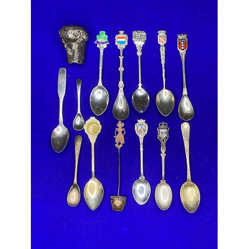 864 - Silver plate, continental silver and Sterling silver items including spoons and a walking stick top.