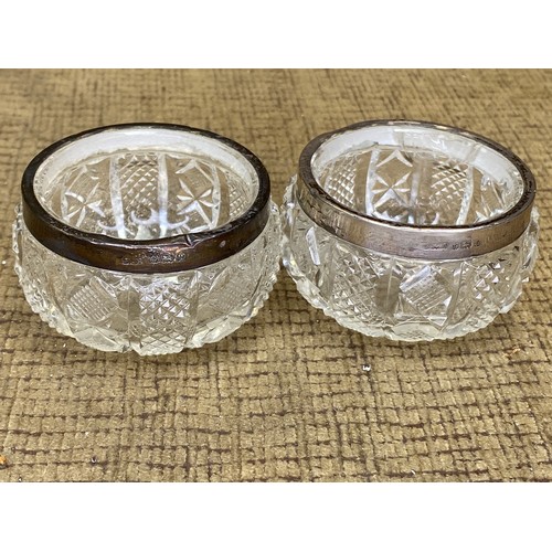 1142 - Two lead crystal bowls with silver rims hallmarked Birmingham.