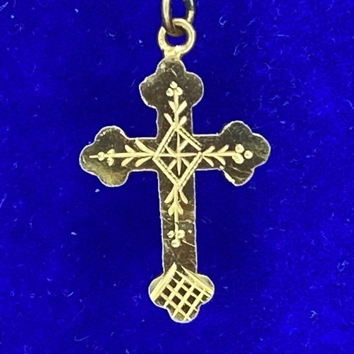 872 - 9ct gold cross pendant 1.6 grams.